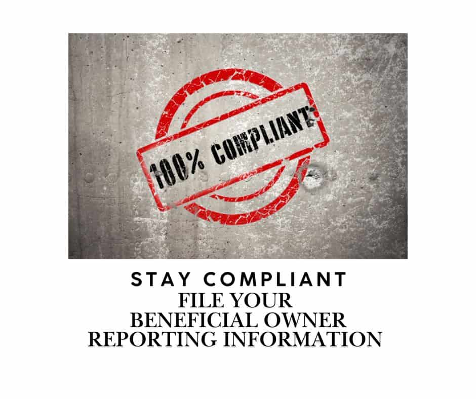 100% compliant stamp on concrete wall image.